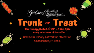 Goldsteins' community trunk or treat voting for the best